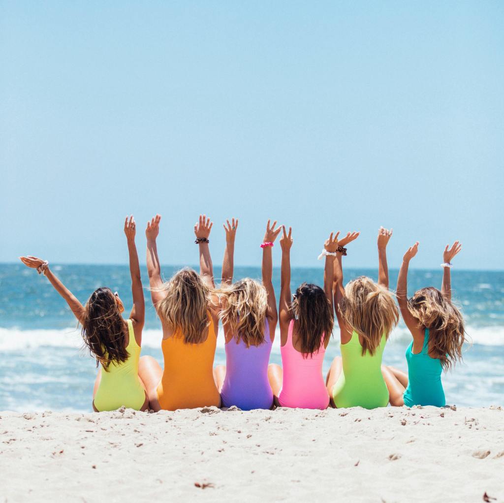 Group of friends enjoying a seaside trip